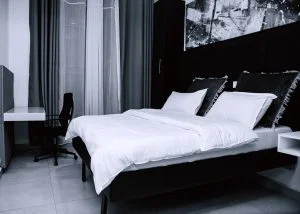 Comfortable bedroom with bed and pillows